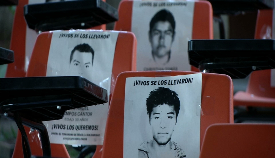 school chairs bear images of disappeared students