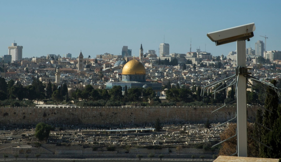 The Dome of the Rock and the old city are seen from the Mount of Olives aside a security camera in Jerusalem on January 13, 2018. (Photo by Emmanuele Contini/NurPhoto via Getty Images)