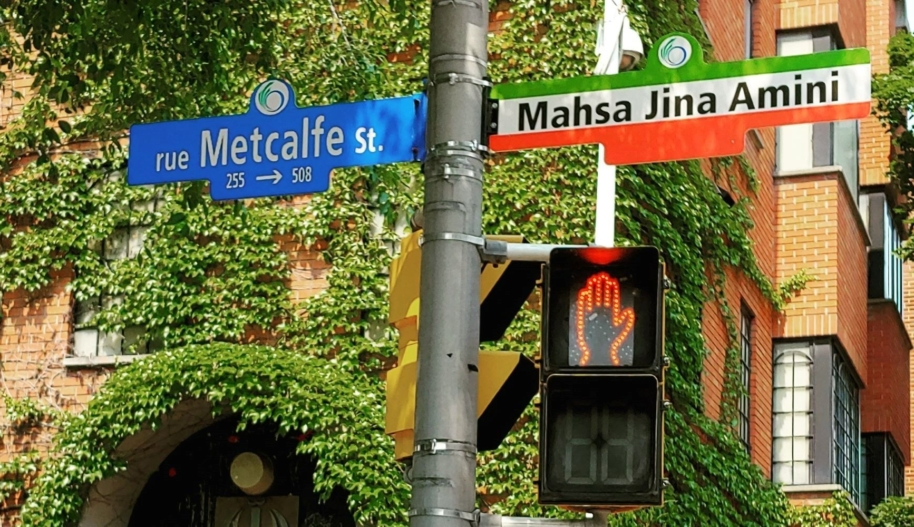 A street sign commemorating Mahsa Jina Amini is installed outside the former Embassy of Iran on Metcalfe street in Ottawa, June 2023 (c) private