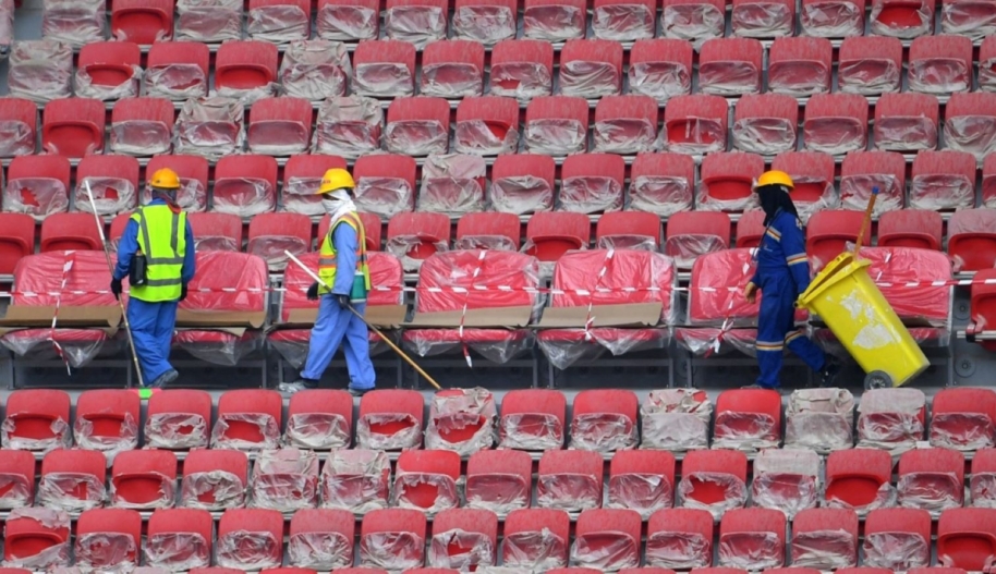 December 17, 2019: construction workers at the stands of Qatar's new al-Bayt Stadium in the capital Doha, which will host matches of the FIFA football World Cup 2022. Photo by GIUSEPPE CACACE/AFP via Getty Images