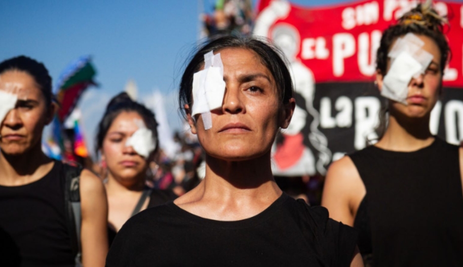 Demonstrators gather on 29 November 2019 in the center of the Santiago de Chile, Chile to protest against the abuses of the security forces, including eye injuries from misuse of weapons. Photo by Federico Rotter/NurPhoto via Getty Images.