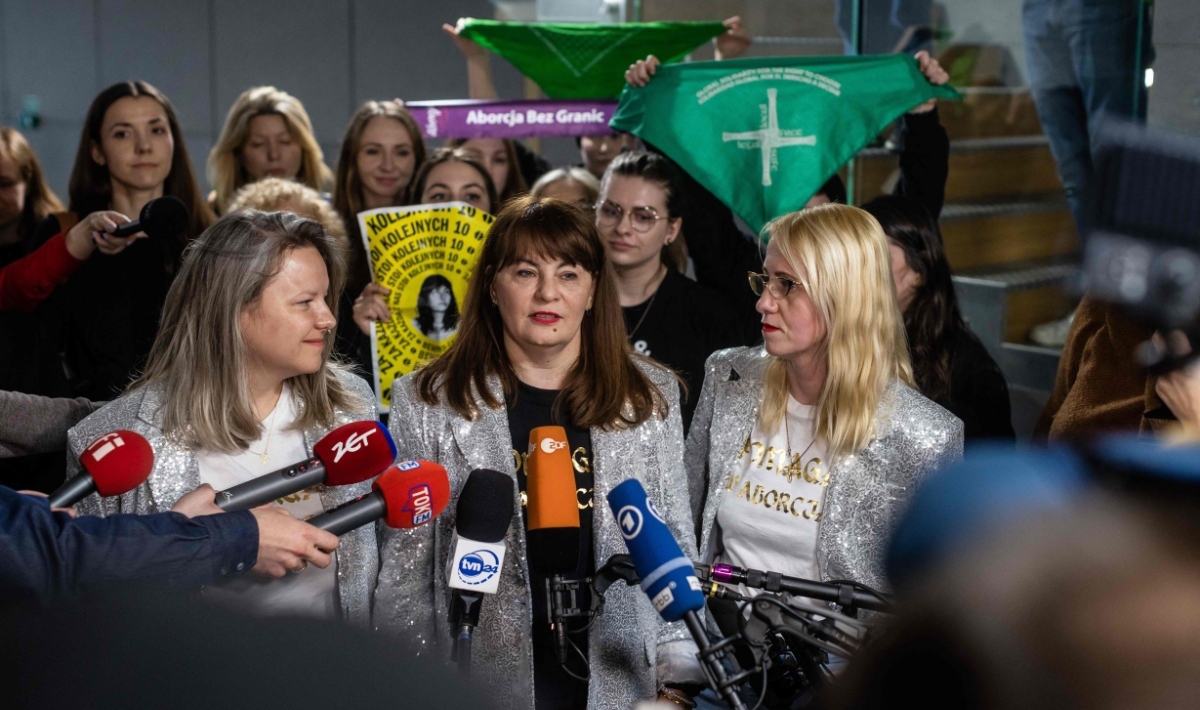 Polish activist Justyna Wydrzynska talks to the press after being found guilty of giving abortion assistance in district court in Warsaw, March 14, 2023. - Polish activist Justyna Wydrzynska was found guilty of supplying a pregnant woman with abortion pills in the Catholic country, her NGO said, in Poland's first such case. (Photo by Wojtek RADWANSKI / AFP) (Photo by WOJTEK RADWANSKI/AFP via Getty Images)